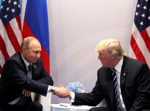 HAMBURG, GERMANY - JULY 7: (----EDITORIAL USE ONLY  MANDATORY CREDIT - " RUSSIAN PRESIDENTIAL PRESS AND INFORMATION OFFICE / HANDOUT" - NO MARKETING NO ADVERTISING CAMPAIGNS - DISTRIBUTED AS A SERVICE TO CLIENTS----)  Russia's President Vladimir Putin (L) and US President Donald Trump (R) shake hands during a bilateral meeting on the sidelines of the  G20 summit in Hamburg, Germany, on July 7, 2017.  (Photo by Russian Presidential Press and Information Office/Anadolu Agency/Getty Images)