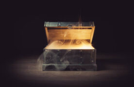 pandoras box with smoke on a wooden background